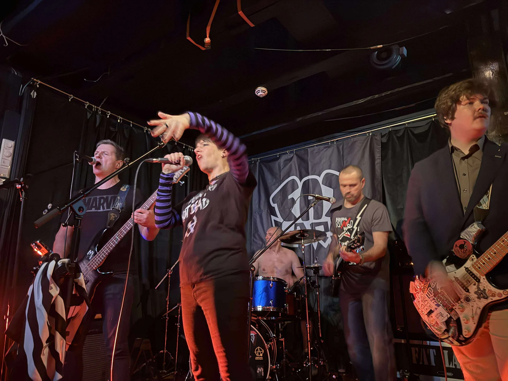 Fat Lars performing together on stage